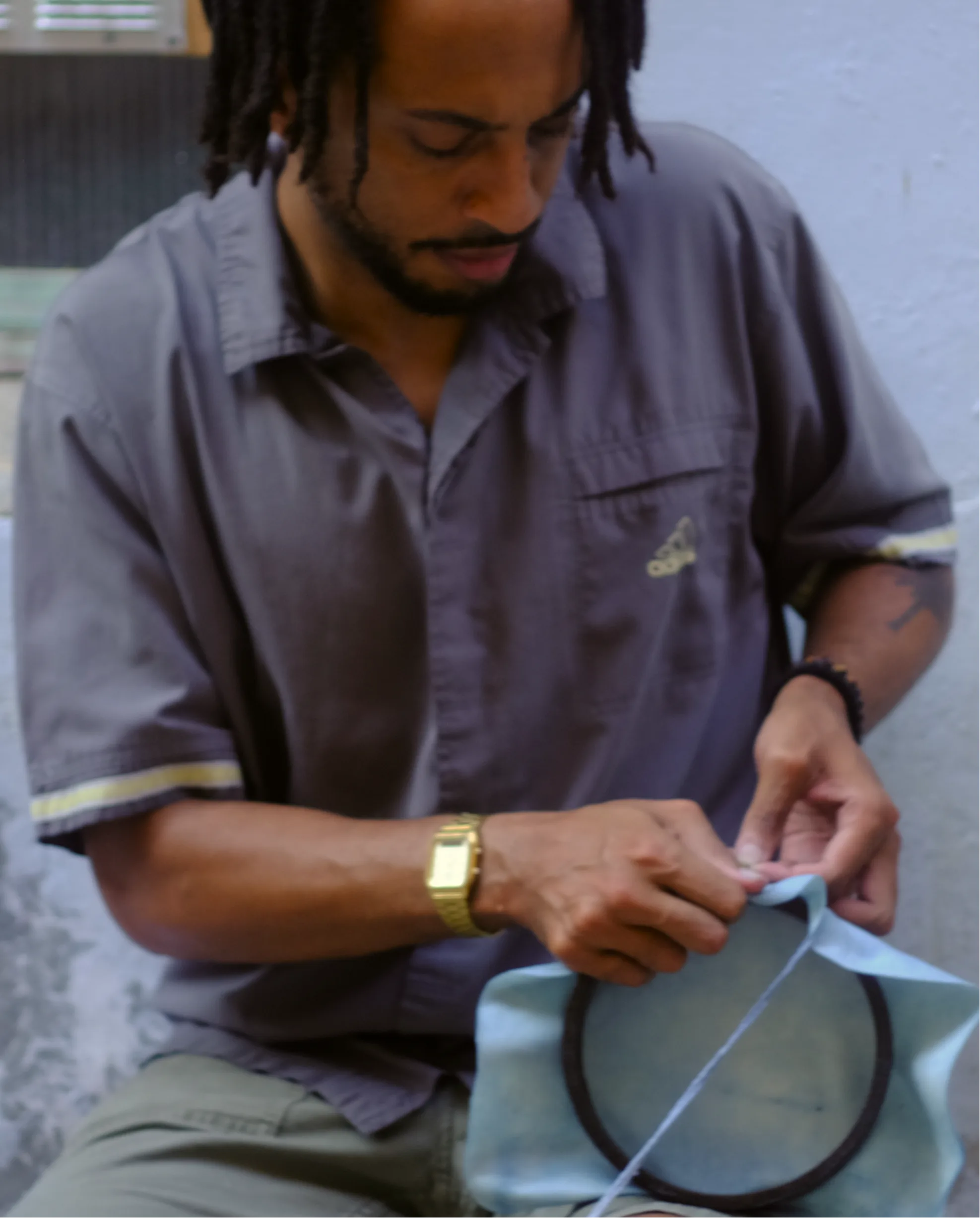 Goat skin dyed indigo, mounted on the drum